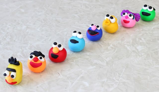 Tiny clay characters on a street